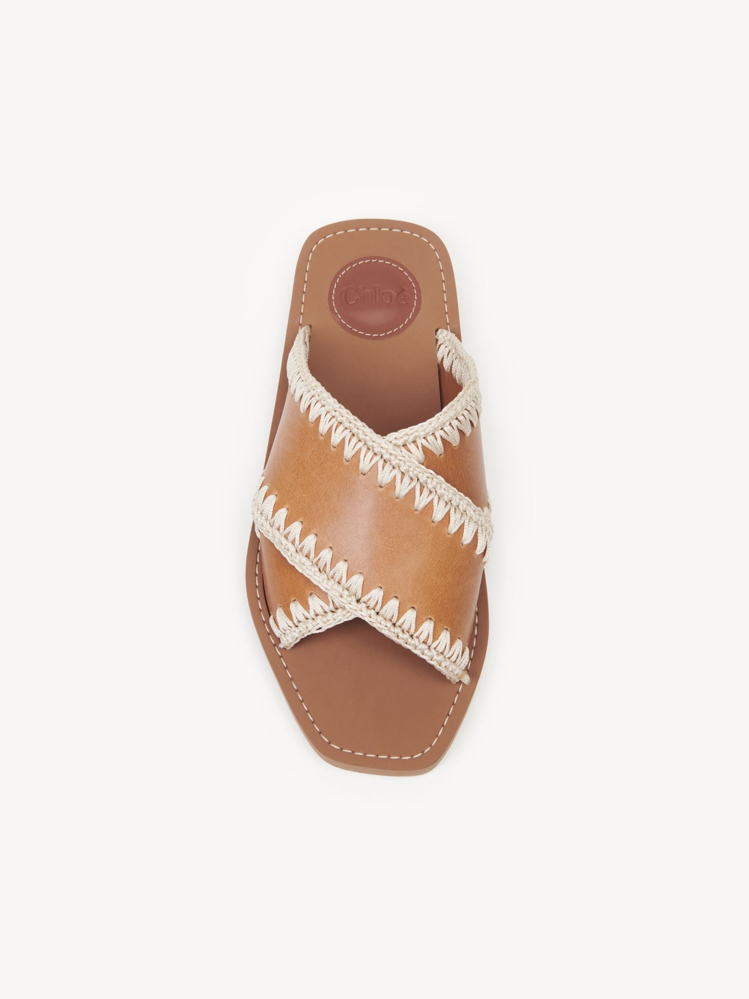 Mules plates Woody croisées en cuir - Luminous Ochre