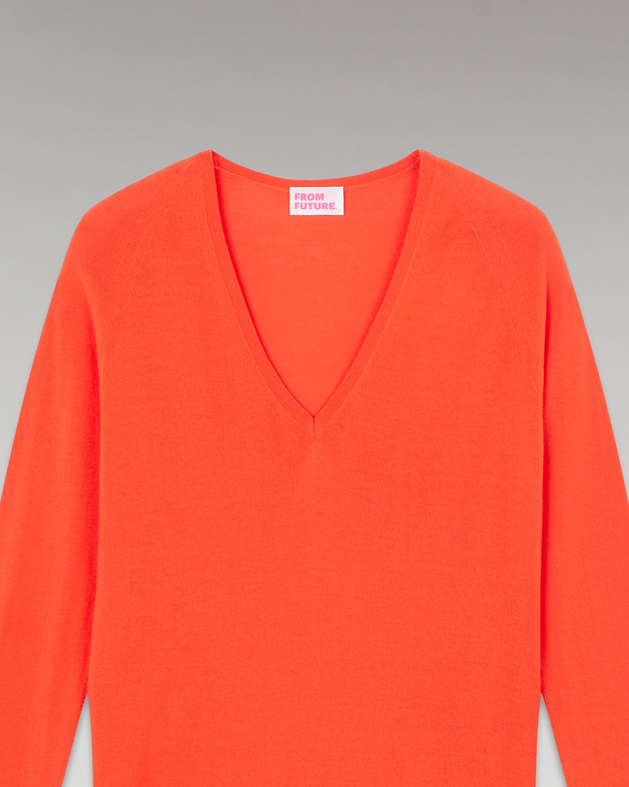 Pull à col V et coupe oversize en laine mérinos - Neon Orange
