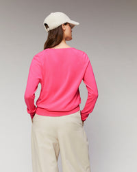 Pull à col V et coupe oversize en laine mérinos - Neon Pink