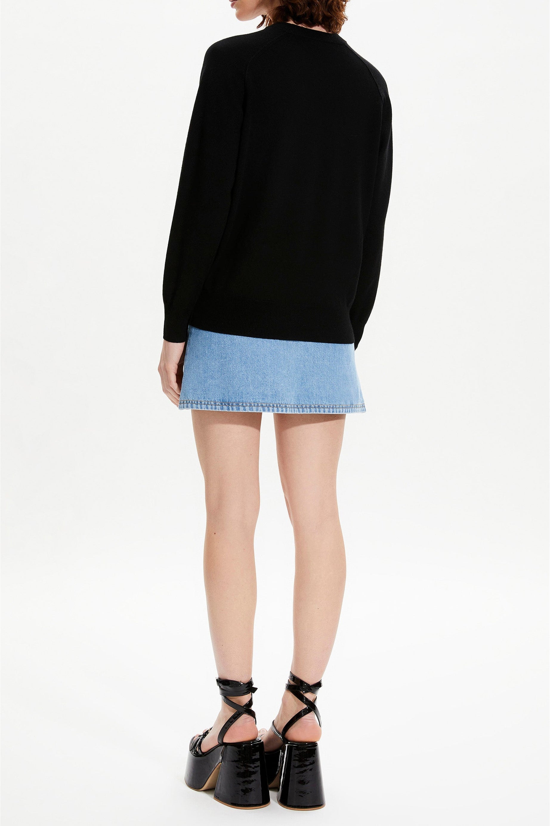 Pull avec un cœur en laine - Noir