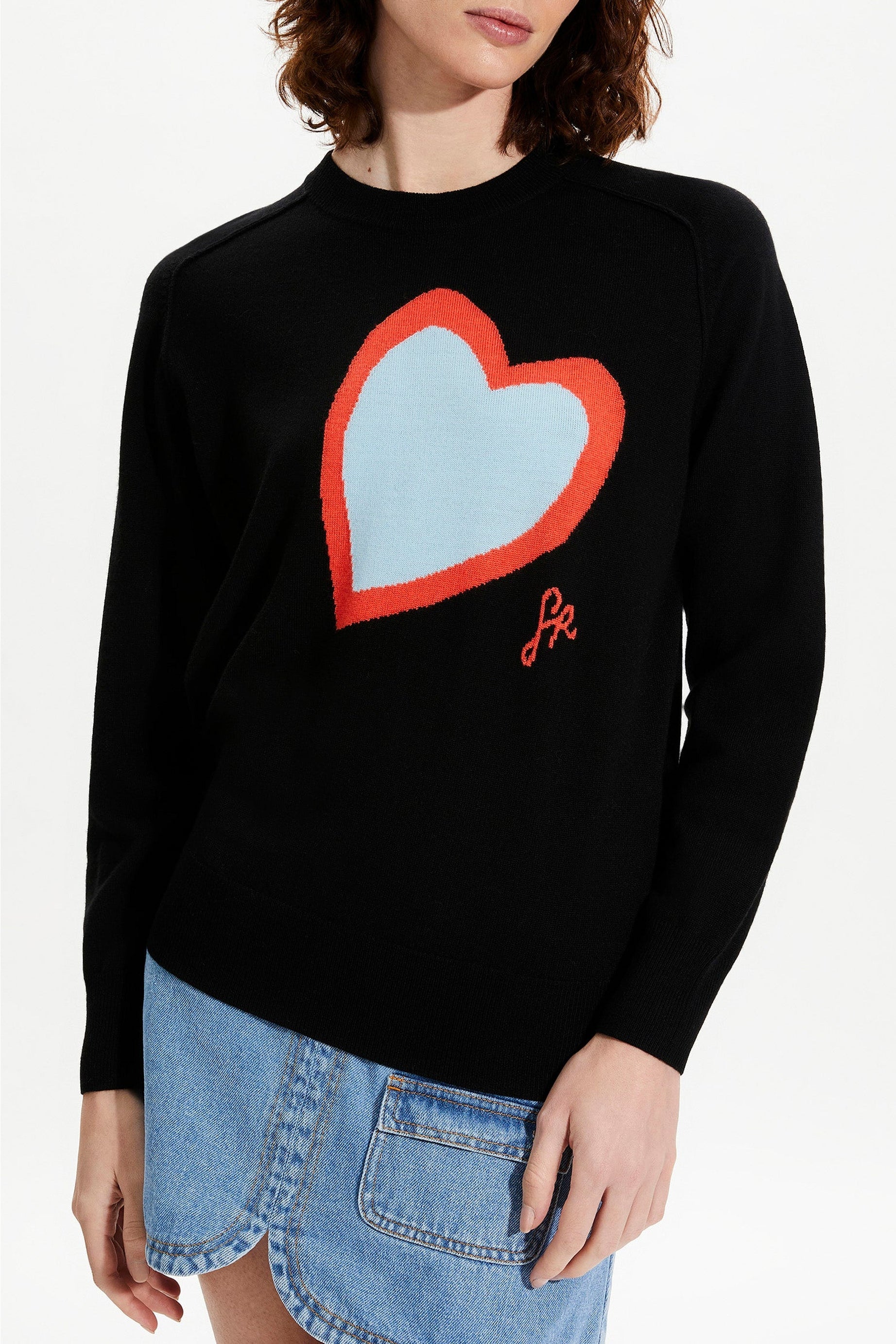 Pull avec un cœur en laine - Noir