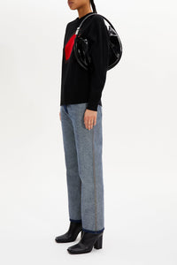 Pull avec un cœur en laine - Noir
