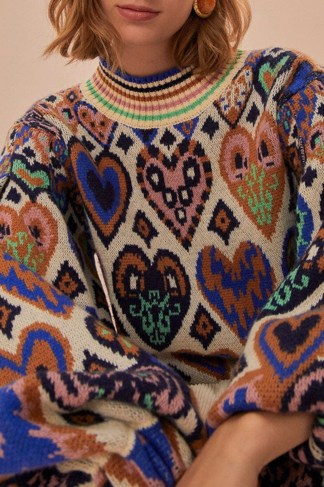 Pull à motif Ikat en forme de cœur en laine - Beige