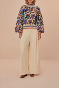 Pull à motif Ikat en forme de cœur en laine - Beige