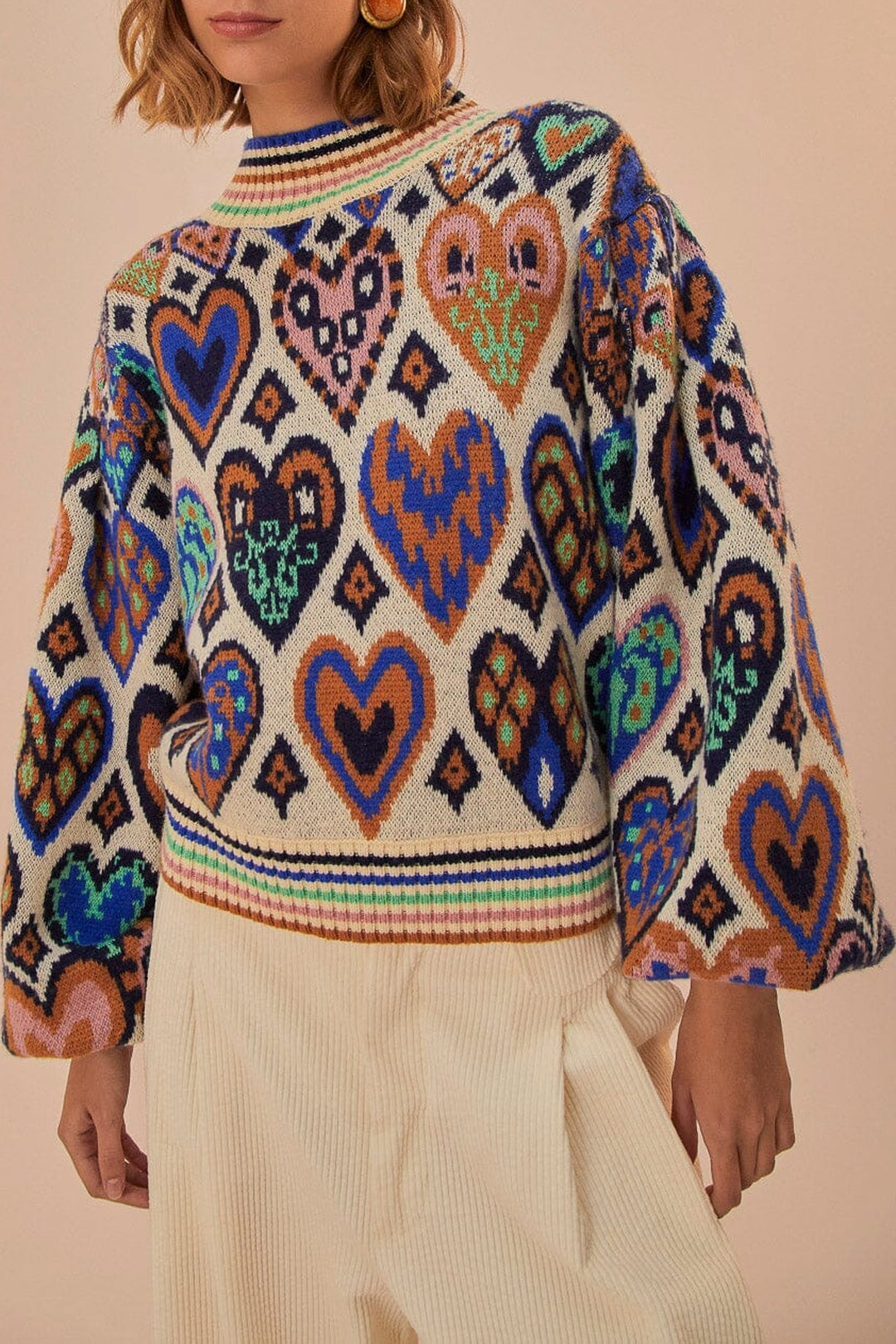 Pull à motif Ikat en forme de cœur en laine - Beige
