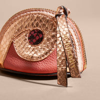 Porte-monnaie en cuir à imprimé python - Copper Pink