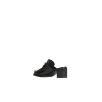 Mules à talon en cuir et franges contrastantes - Black
