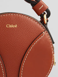 Mini sac rond Daria en cuir - Auburn Orange