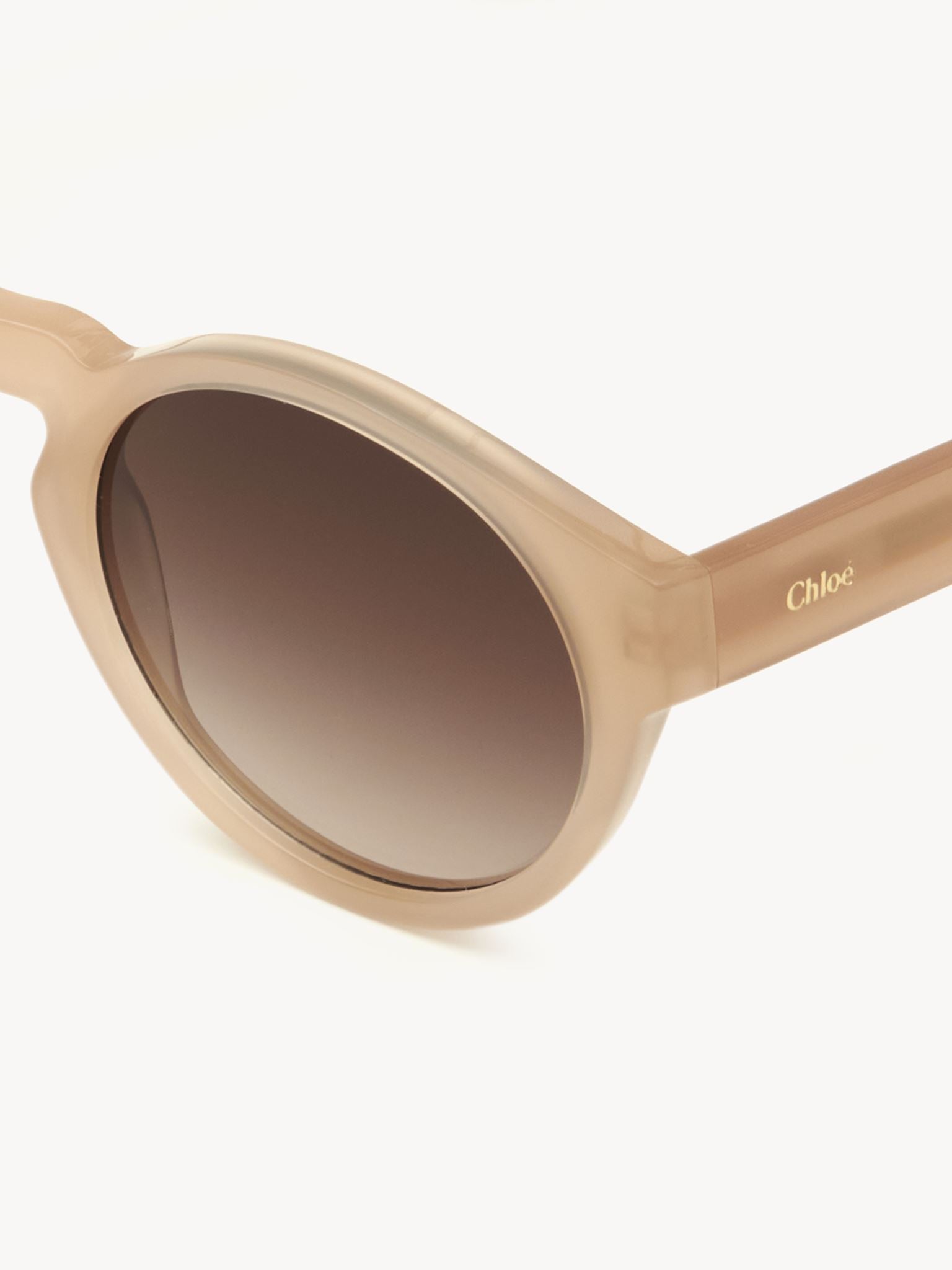Lunettes de soleil rondes Xena - Nude Crystal