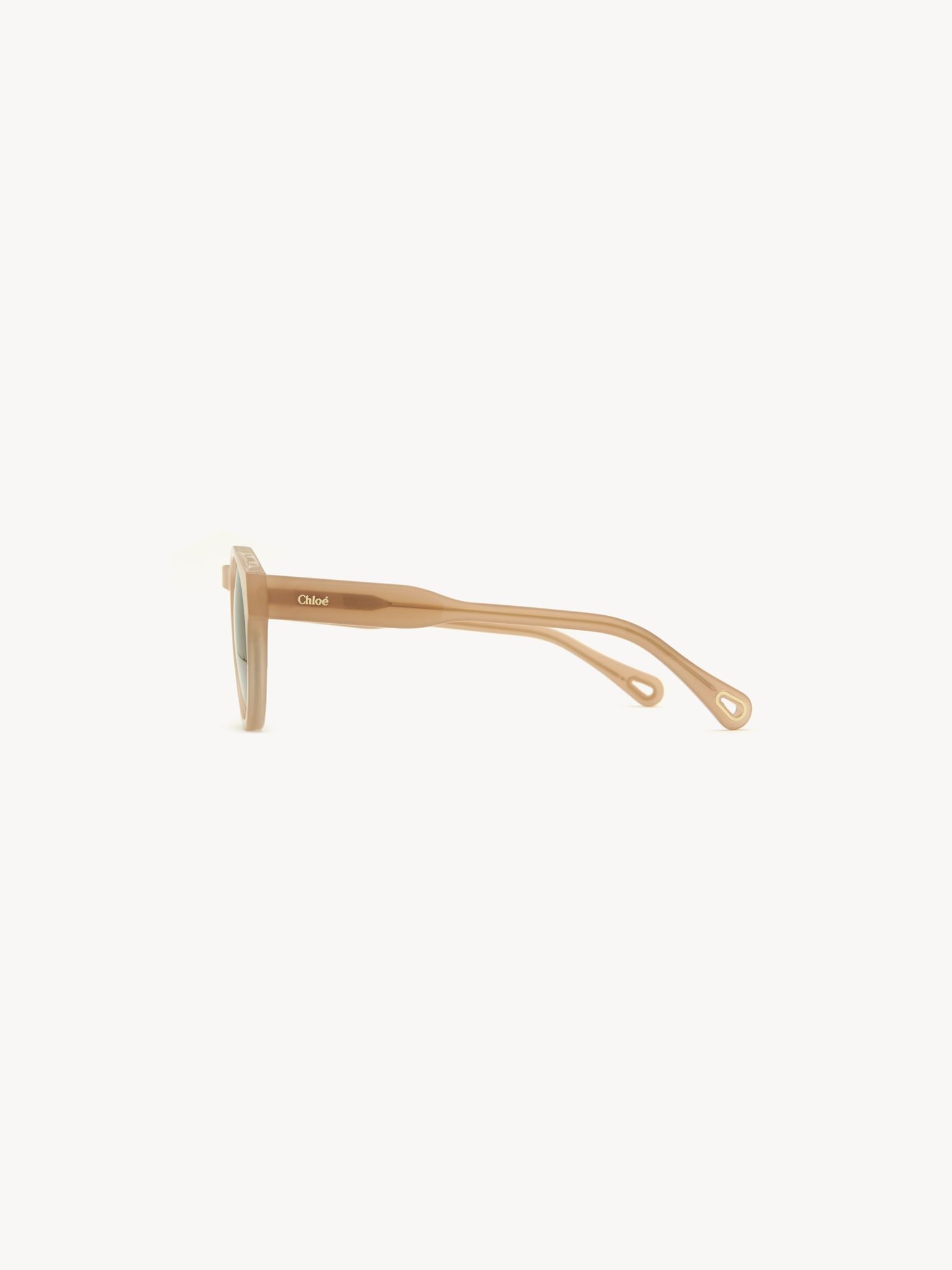 Lunettes de soleil rondes Xena - Nude Crystal