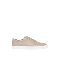 Sneakers en cuir à logo plaqué or - Honey & Archive