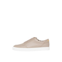 Sneakers en cuir à logo plaqué or - Honey & Archive
