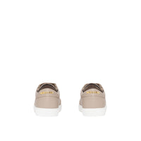 Sneakers en cuir à logo plaqué or - Honey & Archive
