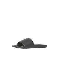 Mules plates en cuir perforé - Black