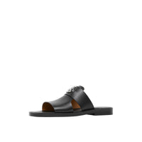 Mules en cuir à motif monogramme - Black