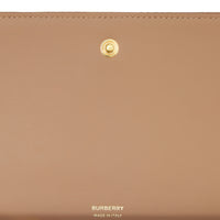 Portefeuille continental Lola en cuir d'agneau matelassé - Camel