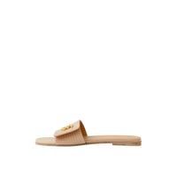 Mules plates en cuir à motif monogramme - Pale Nude
