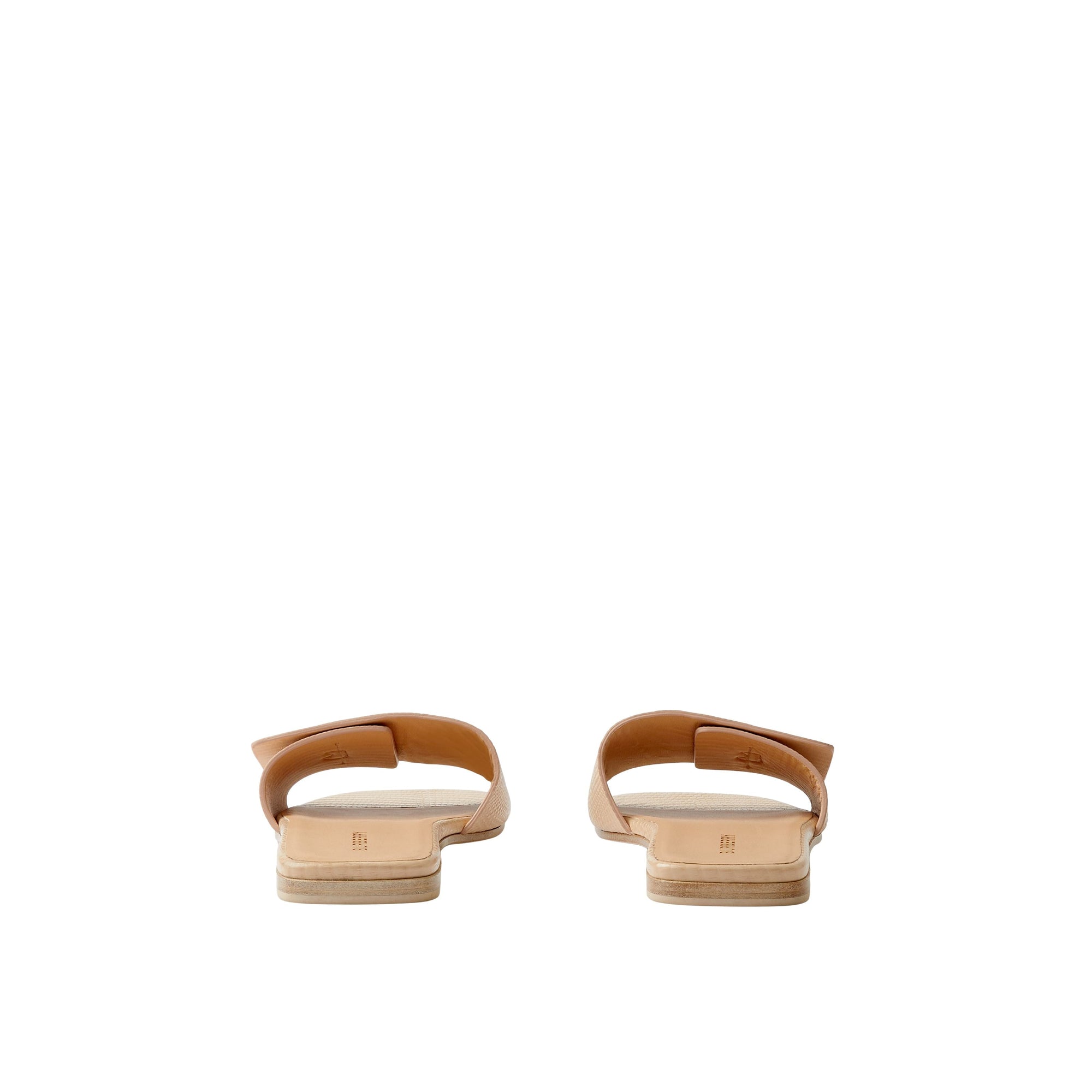 Mules plates en cuir à motif monogramme - Pale Nude