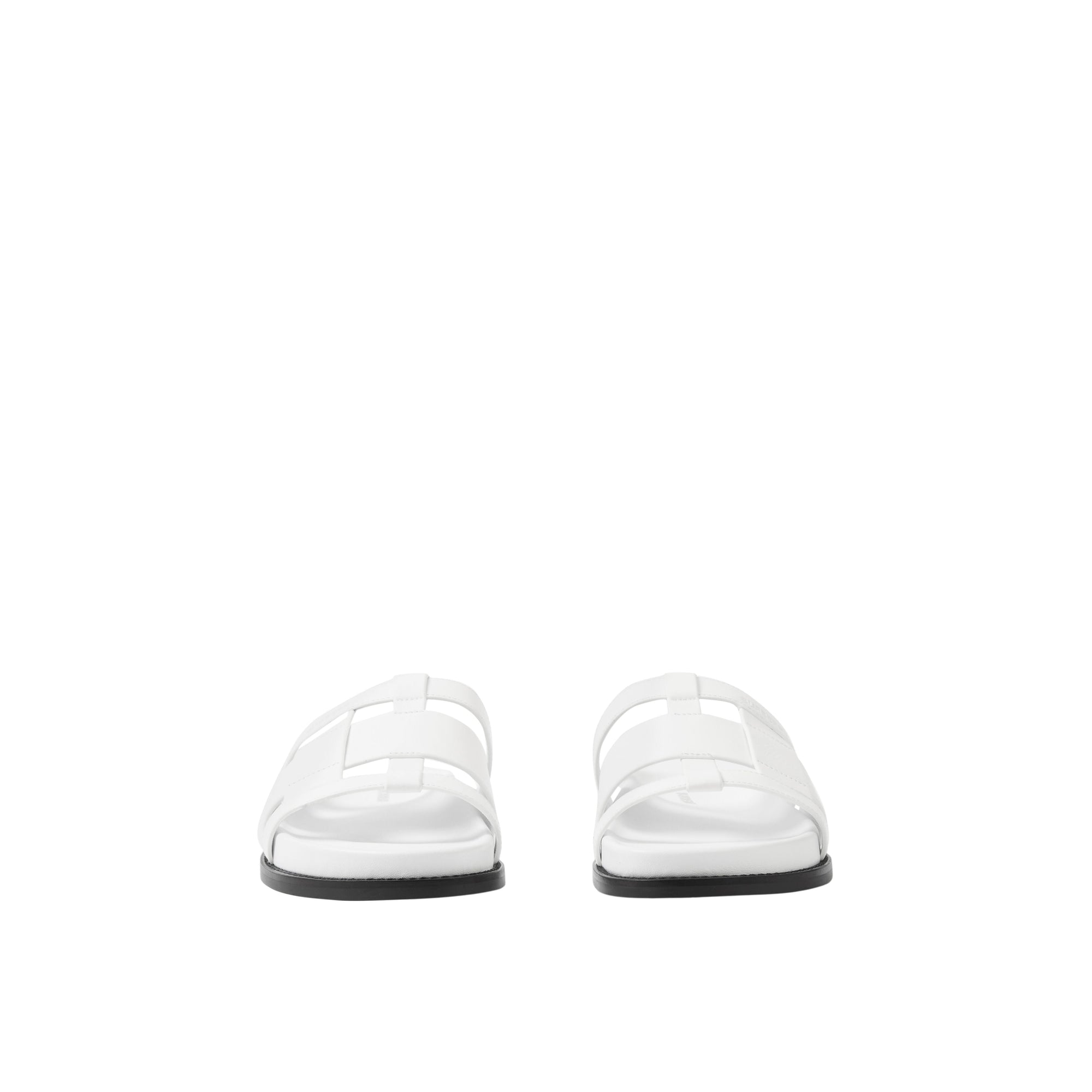 Mules plates en cuir tressé - White