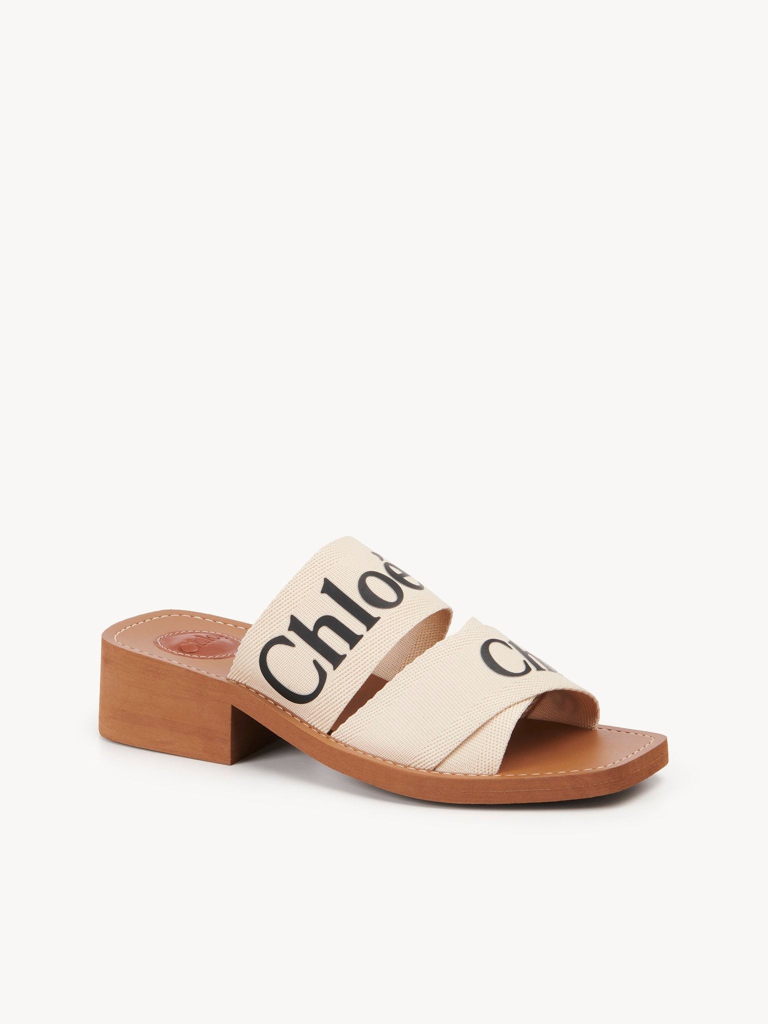 Mules Woody à talons - White