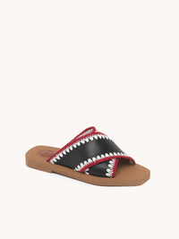 Mules plates Woody croisées en cuir - Black