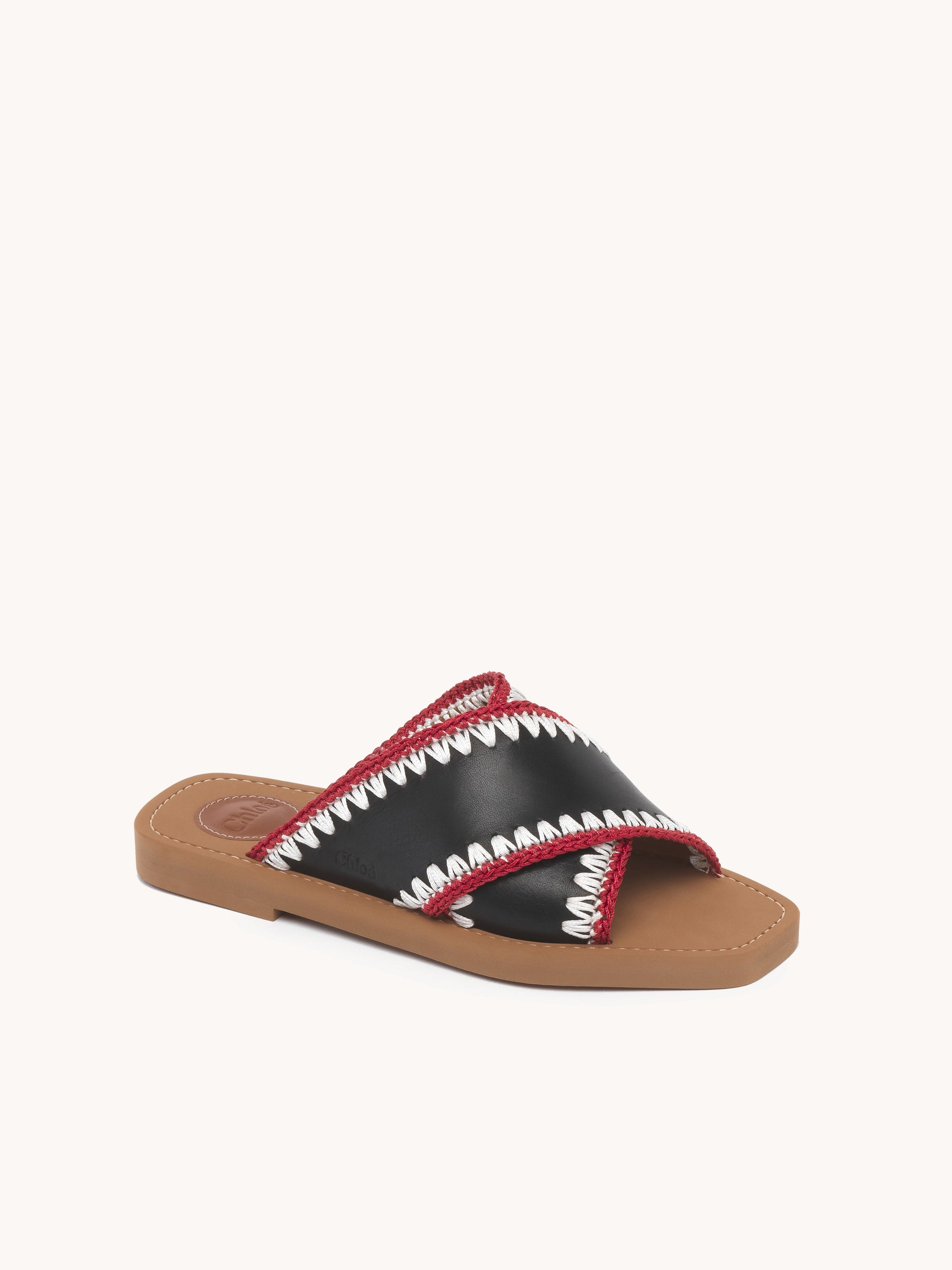 Mules plates Woody croisées en cuir - Black