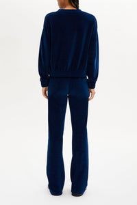 Pantalon effet peau de pêche coupe flare - Bleu Canard