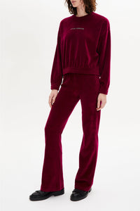 Pantalon effet peau de pêche coupe flare - Framboise