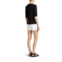 BLACK Haut en coton extensible avec revers à motif check