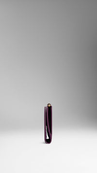 DUSTY VIOLET Portefeuille continental en cuir London verni