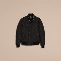 BLACK Veste matelassée à capuche repliable