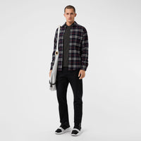 DARK CHARCOAL MEL Polo en piqué de coton avec patte à motif check