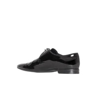 BLACK Chaussures à lacets en cuir ciré