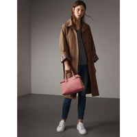 MAUVE PINK Petit sac The Banner en cuir et coton House check