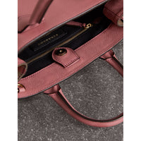 MAUVE PINK Petit sac The Banner en cuir et coton House check
