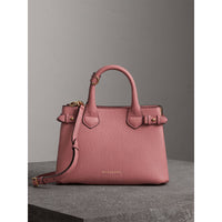 MAUVE PINK Petit sac The Banner en cuir et coton House check
