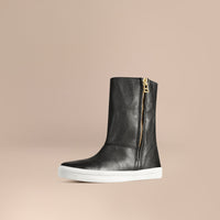 BLACK Bottines en cuir grainé doublées de shearling