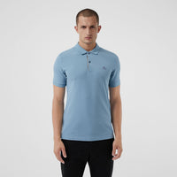 PALE BLUE Polo en piqué de coton avec patte à motif check