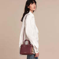 MAHOGANY RED The Baby Banner en cuir et coton House check