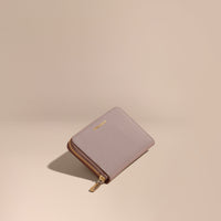PALE GREY Portefeuille zippé en cuir London verni