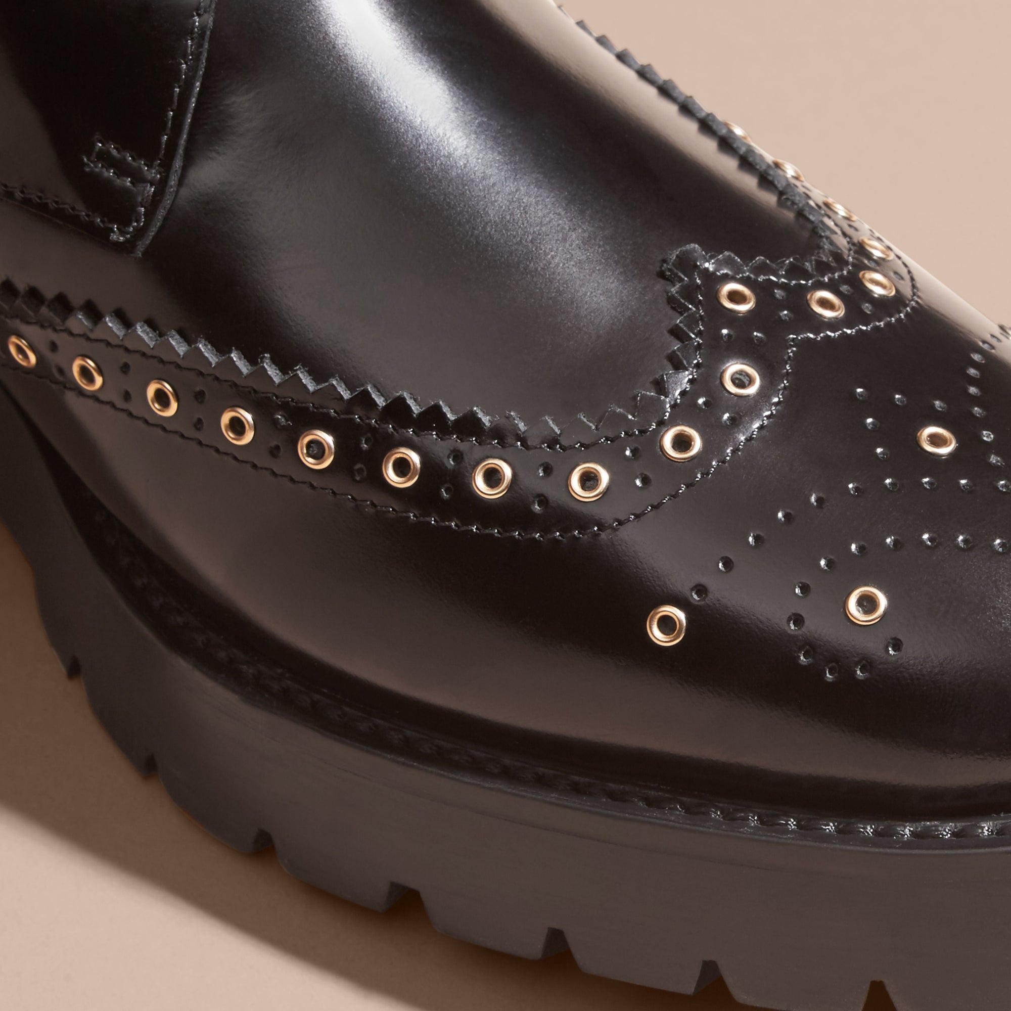 BLACK Bottines à bout golf en cuir et shearling