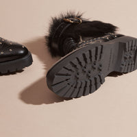 BLACK Bottines à bout golf en cuir et shearling
