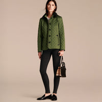 BRIGHT MOSS GREEN Veste matelassée avec col en shearling