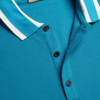 BRIGHT TURQUOISE Polo en piqué de coton avec col rayé
