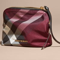PLUM Pochette medium zippée en tissu technique à motif check
