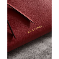 RUSSET RED Clutch en cuir grainé