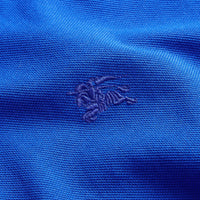 BRILLIANT BLUE Polo à manches longues avec patte à motif check