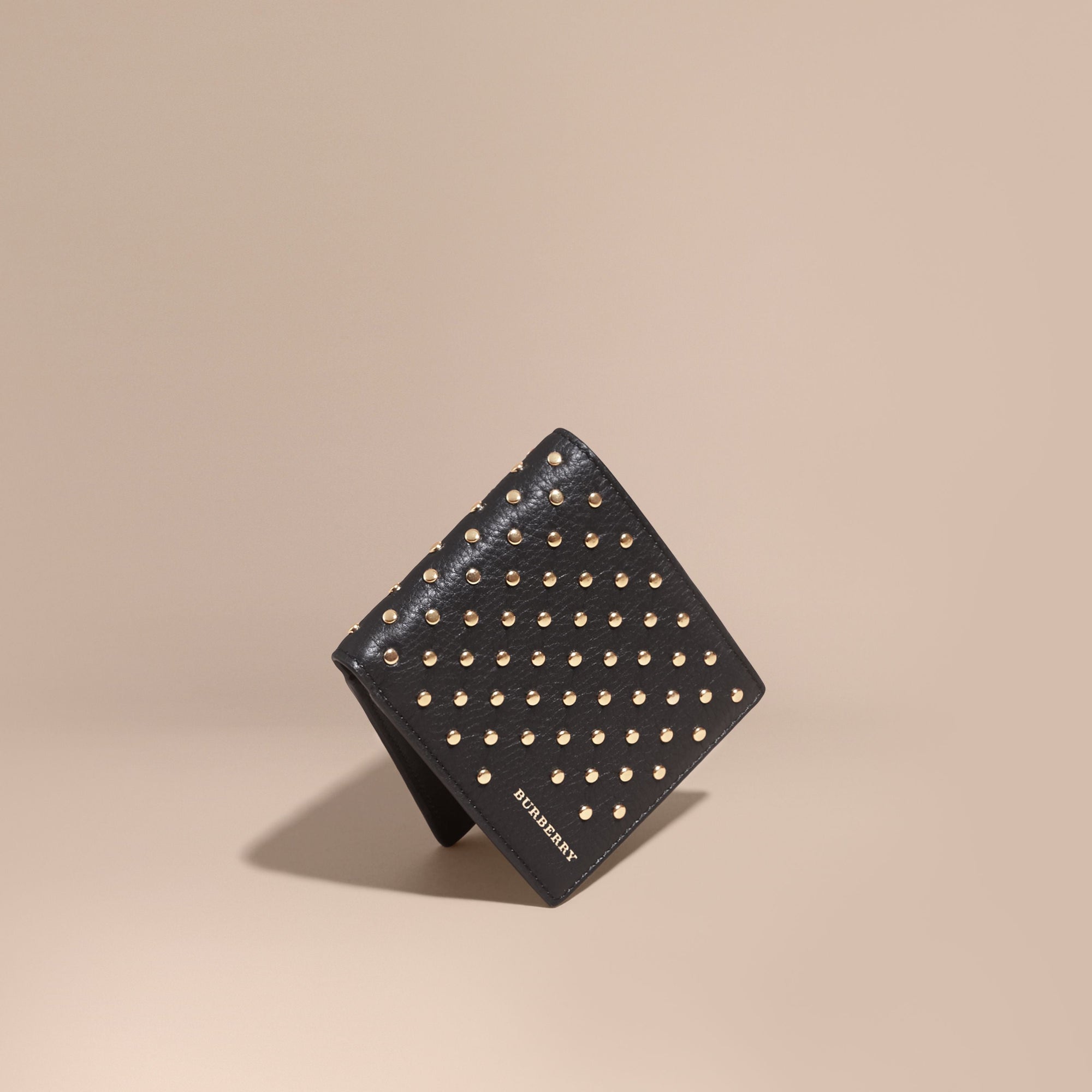 BLACK Portefeuille à rabat multidevise en cuir clouté
