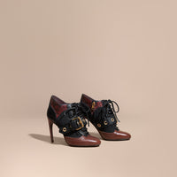 BORDEAUX Bottines en cuir et peau de serpent avec boucle