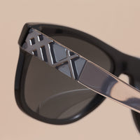 BLACK Lunettes de soleil à monture carrée avec détails check